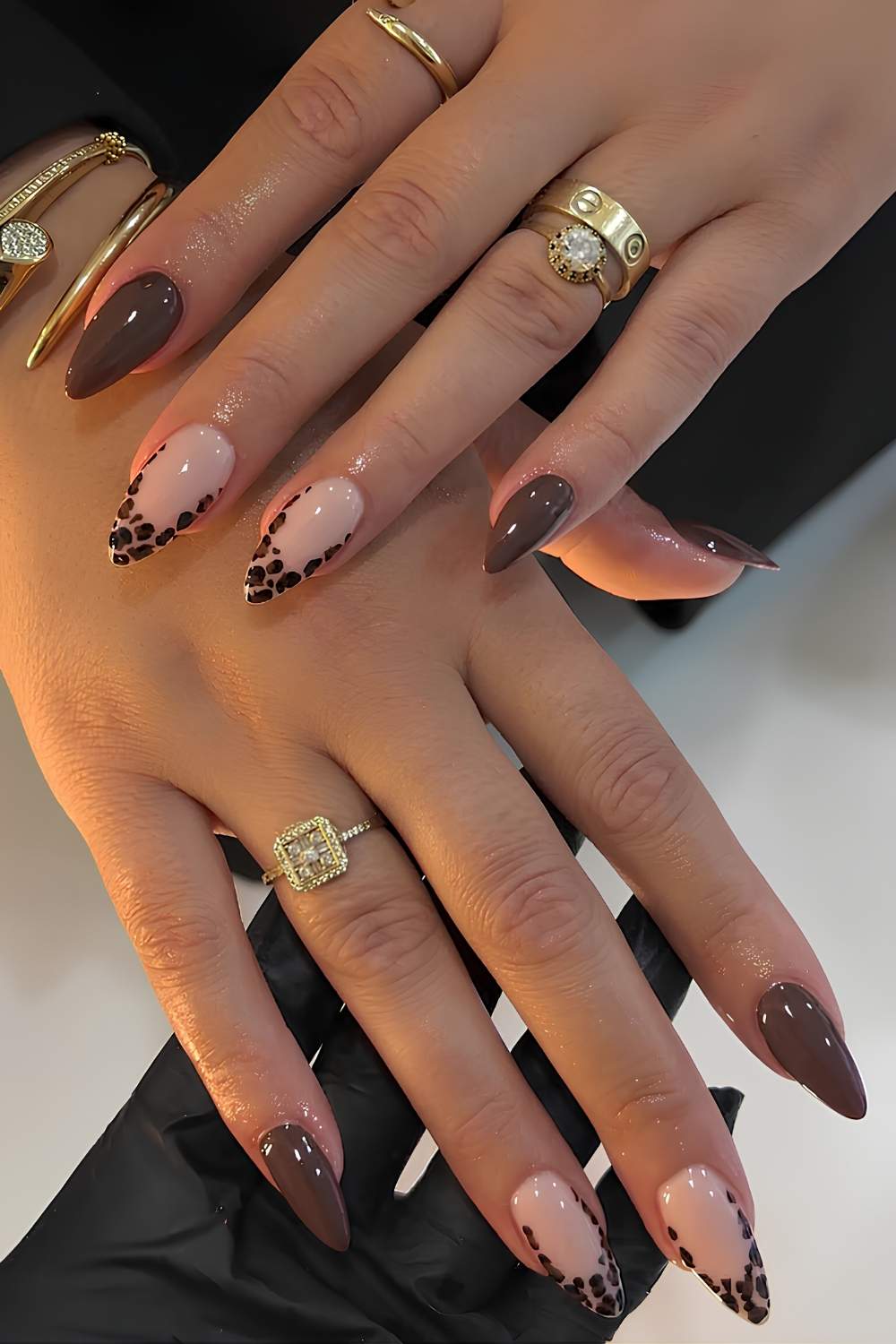Brown manicure with leopard print details