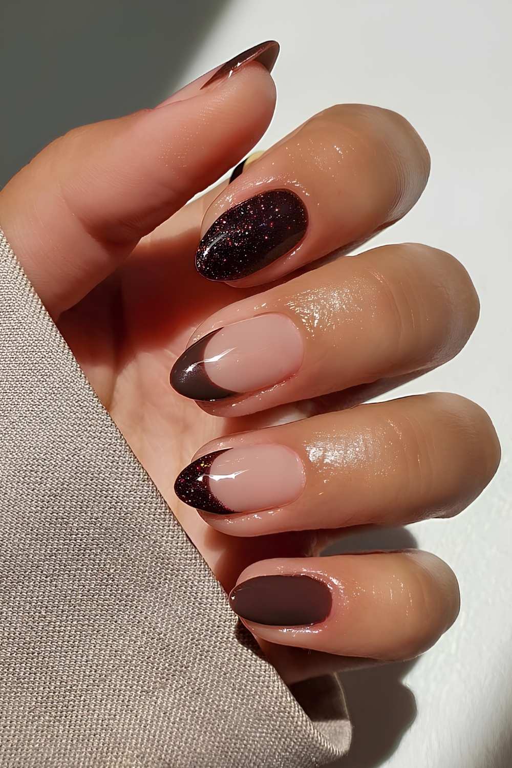 Brown nails with accent French tips and glitter