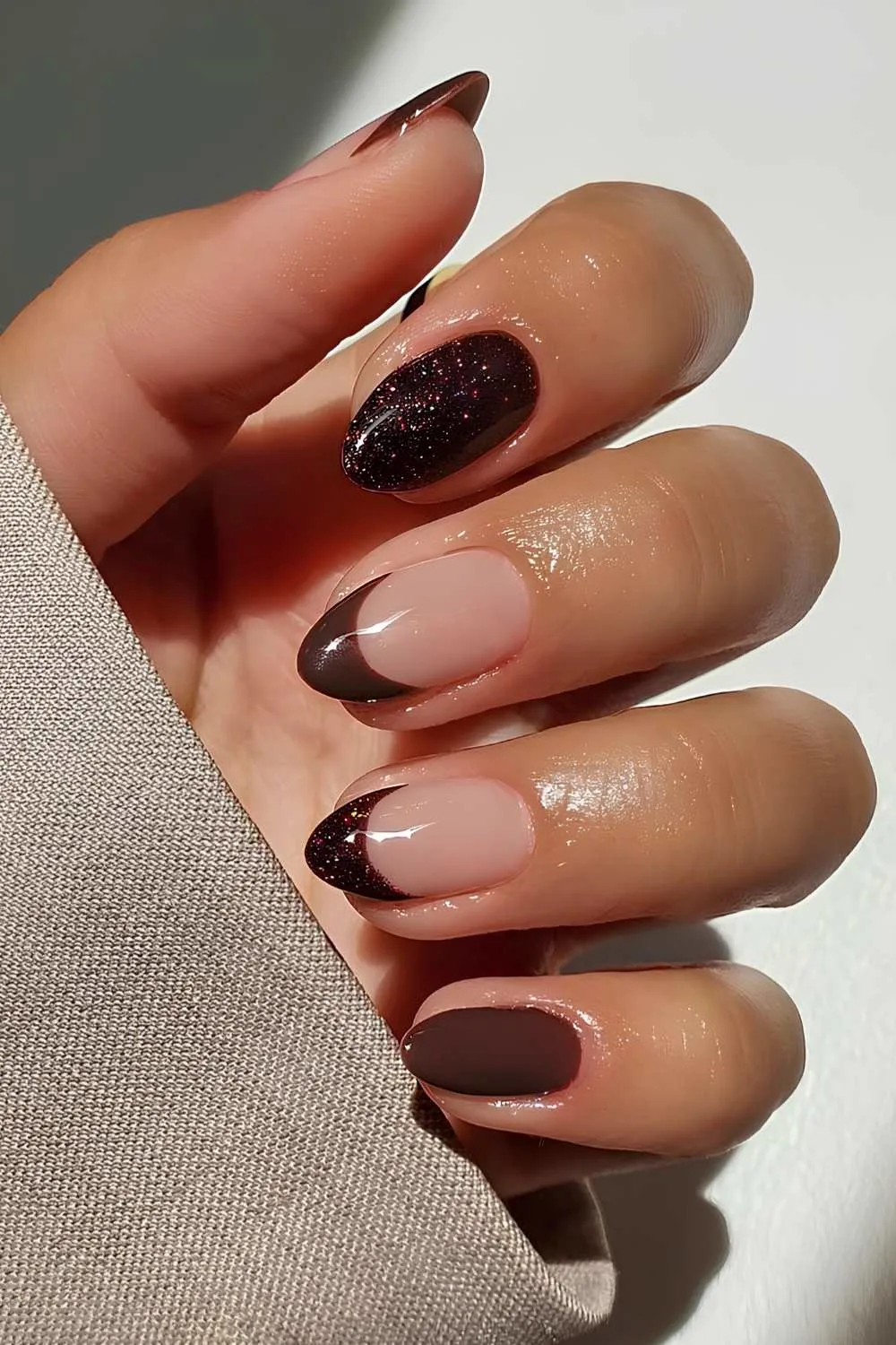 Brown nails with accent French tips and glitter