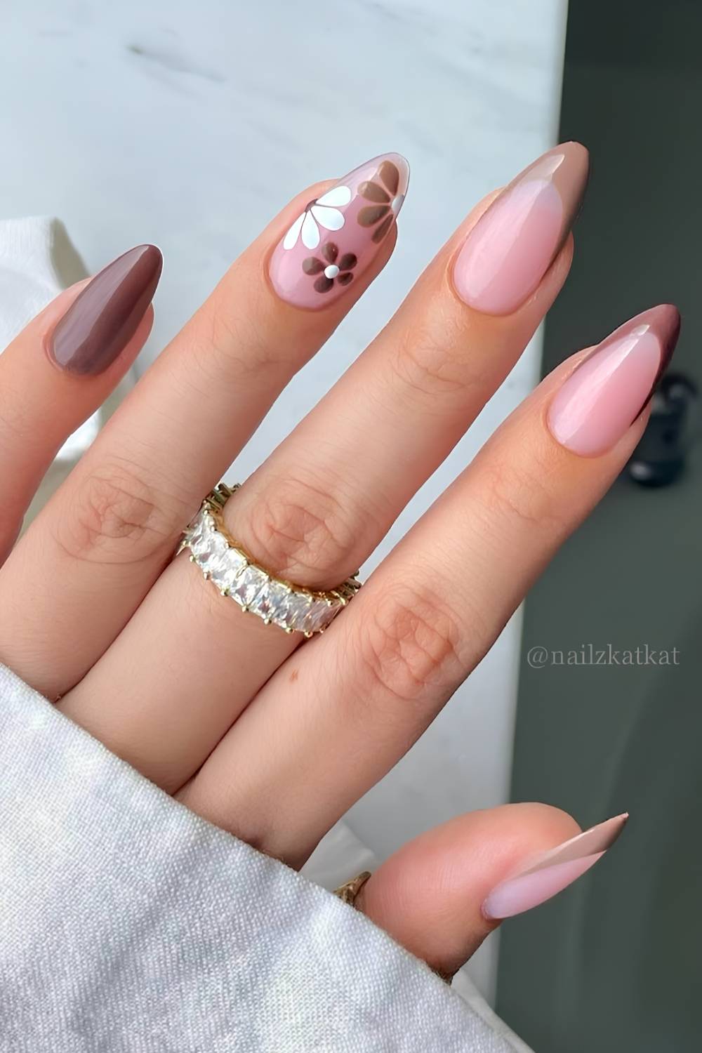 Brown nails with floral art