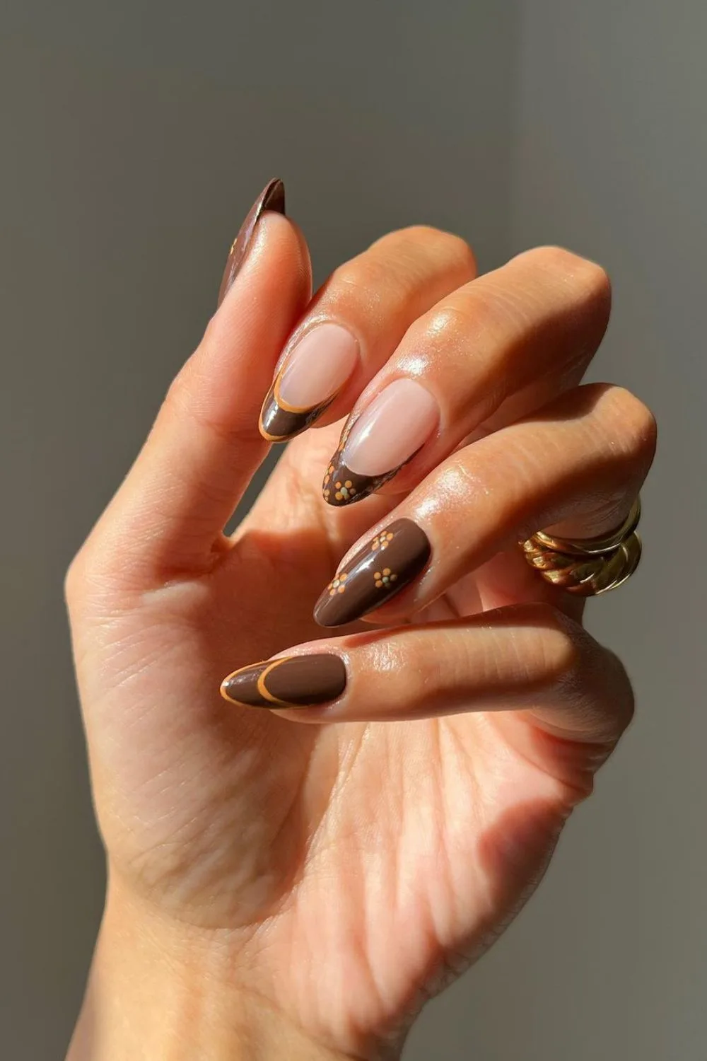 Brown French nails with flowers