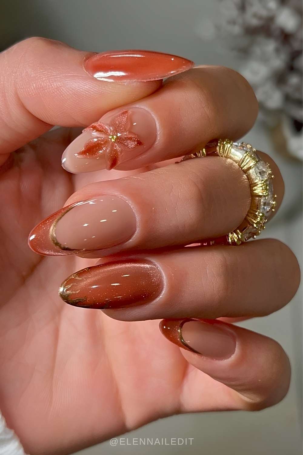 Burnt orange floral cat eye mani