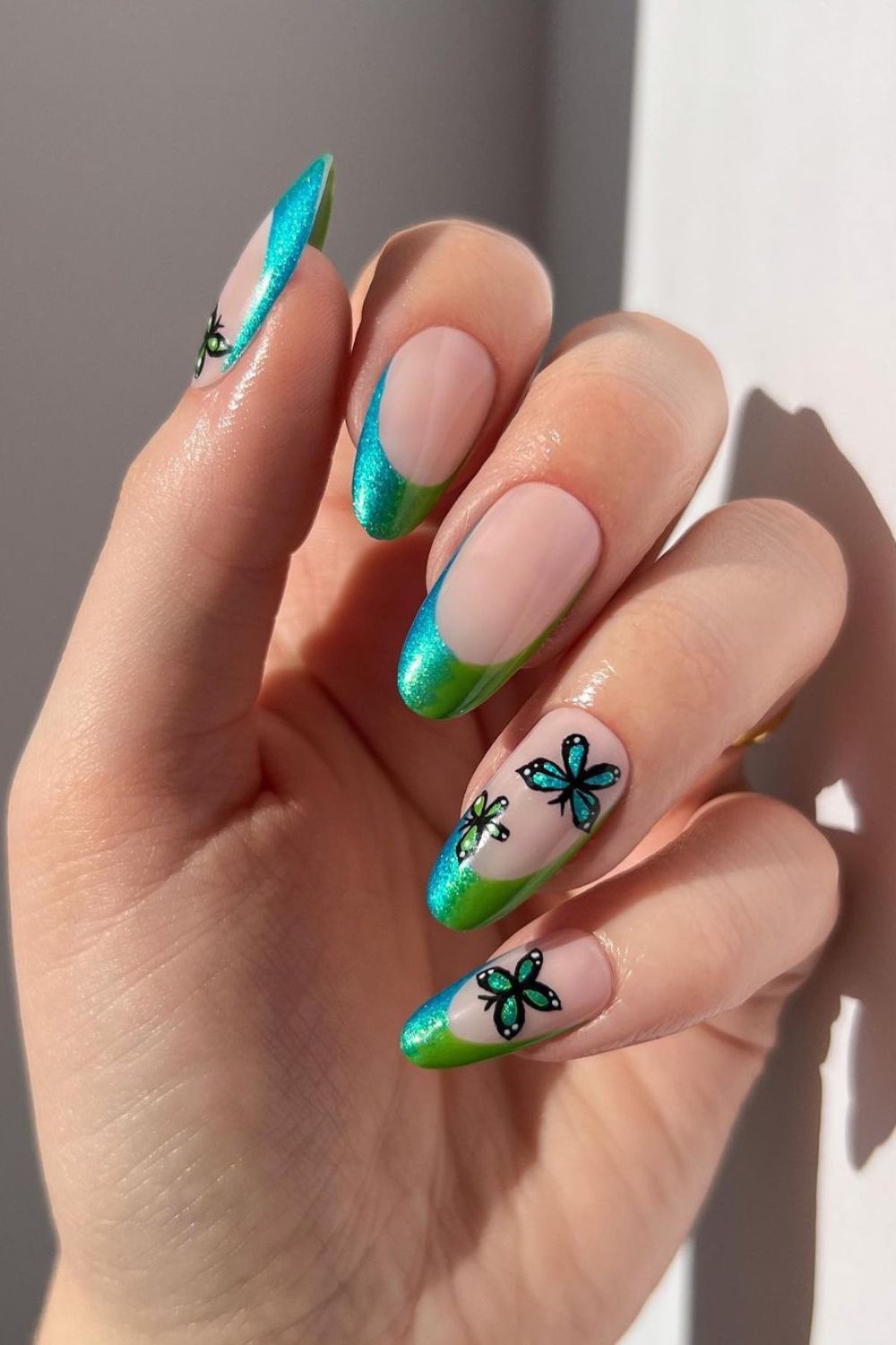 Chrome french nails with butterflies