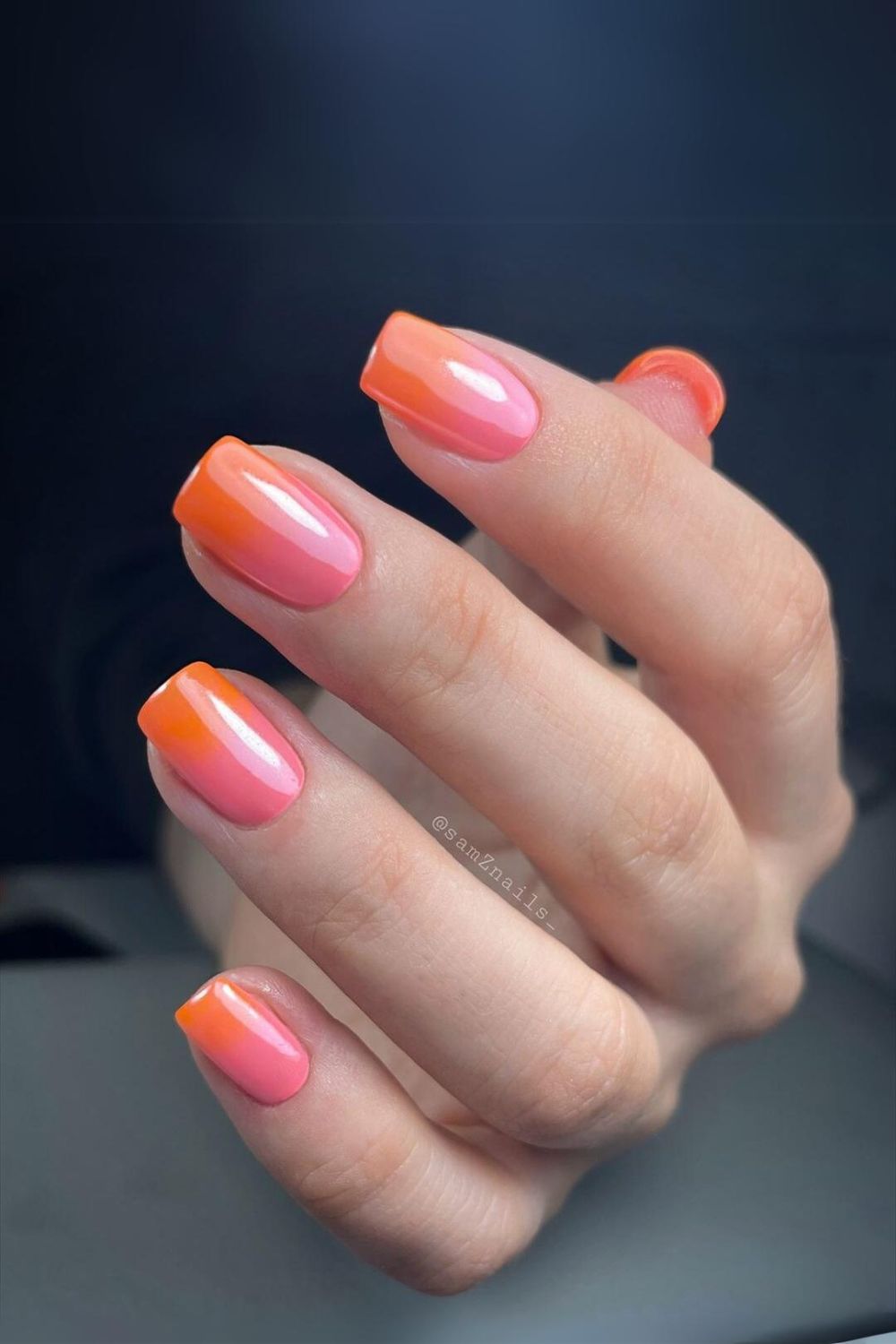 Chrome pink and orange gradient nails