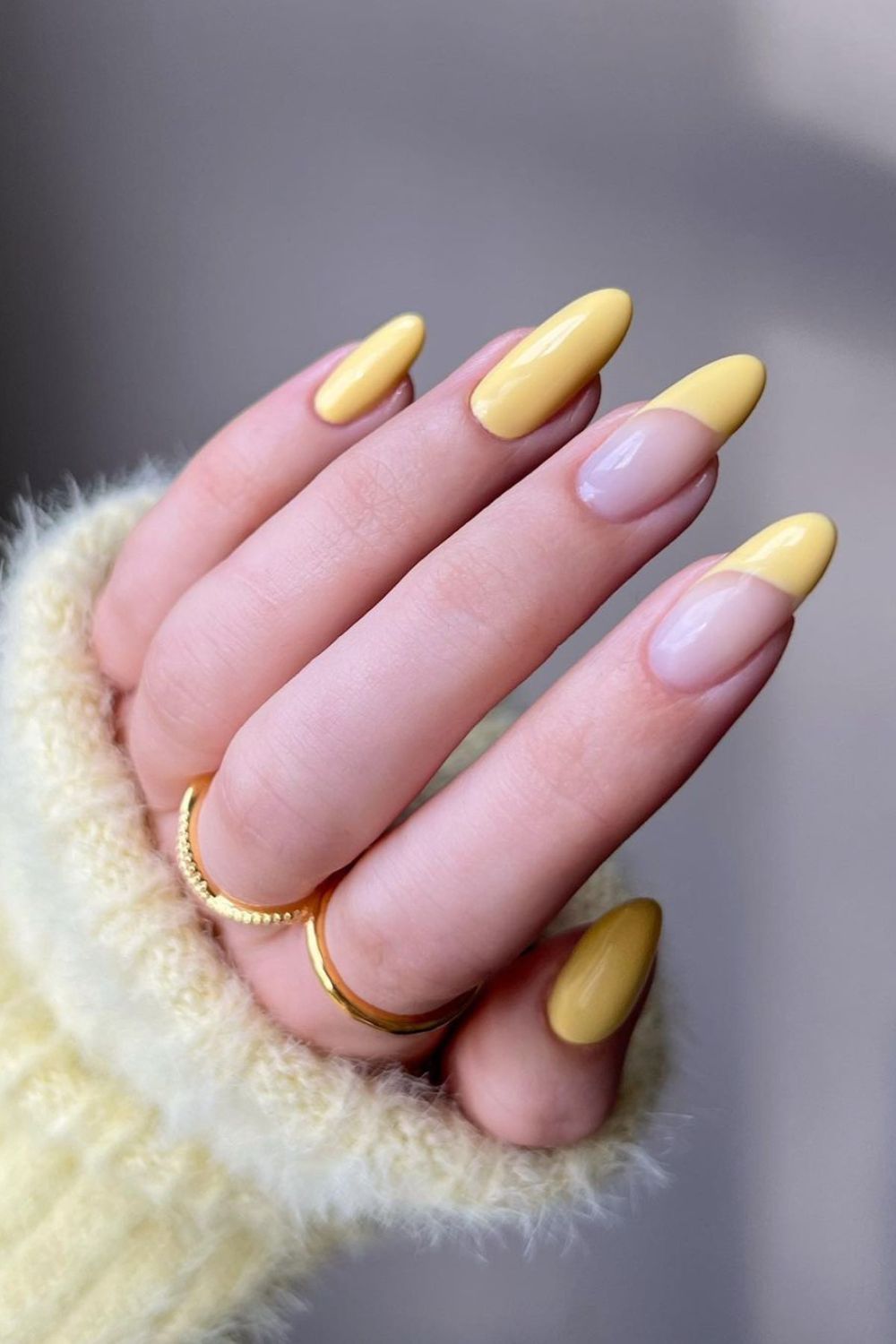 Cream yellow swirled french nails