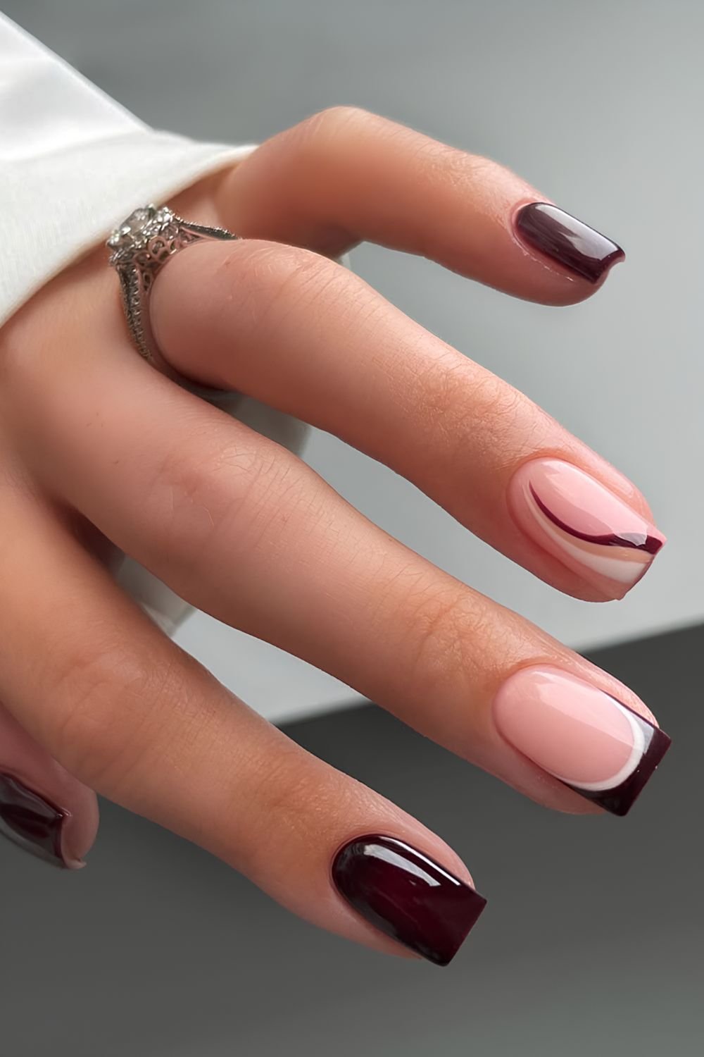 Dark brown mani with accent lines