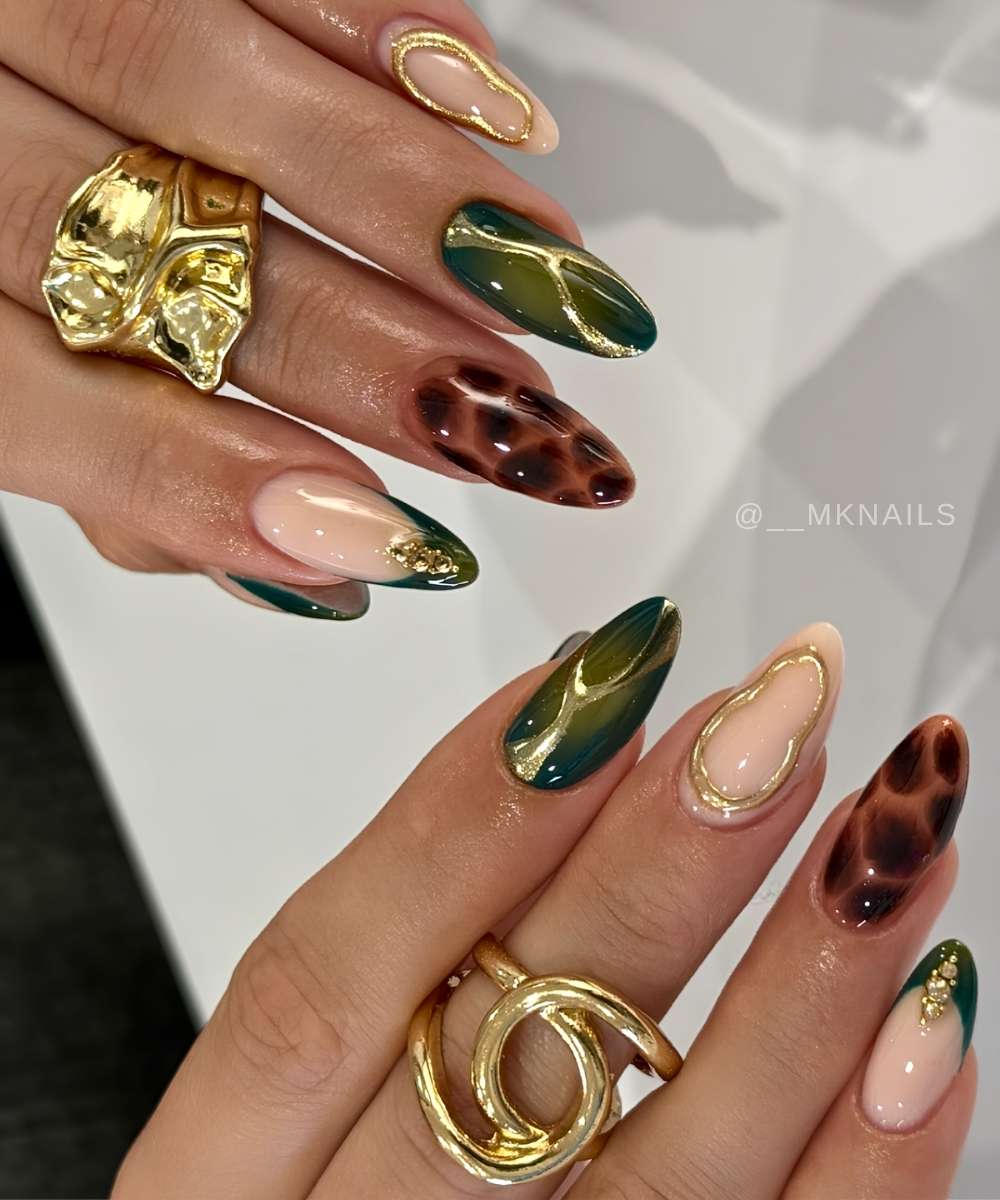 Dark green and gold nails with tortie shell accents
