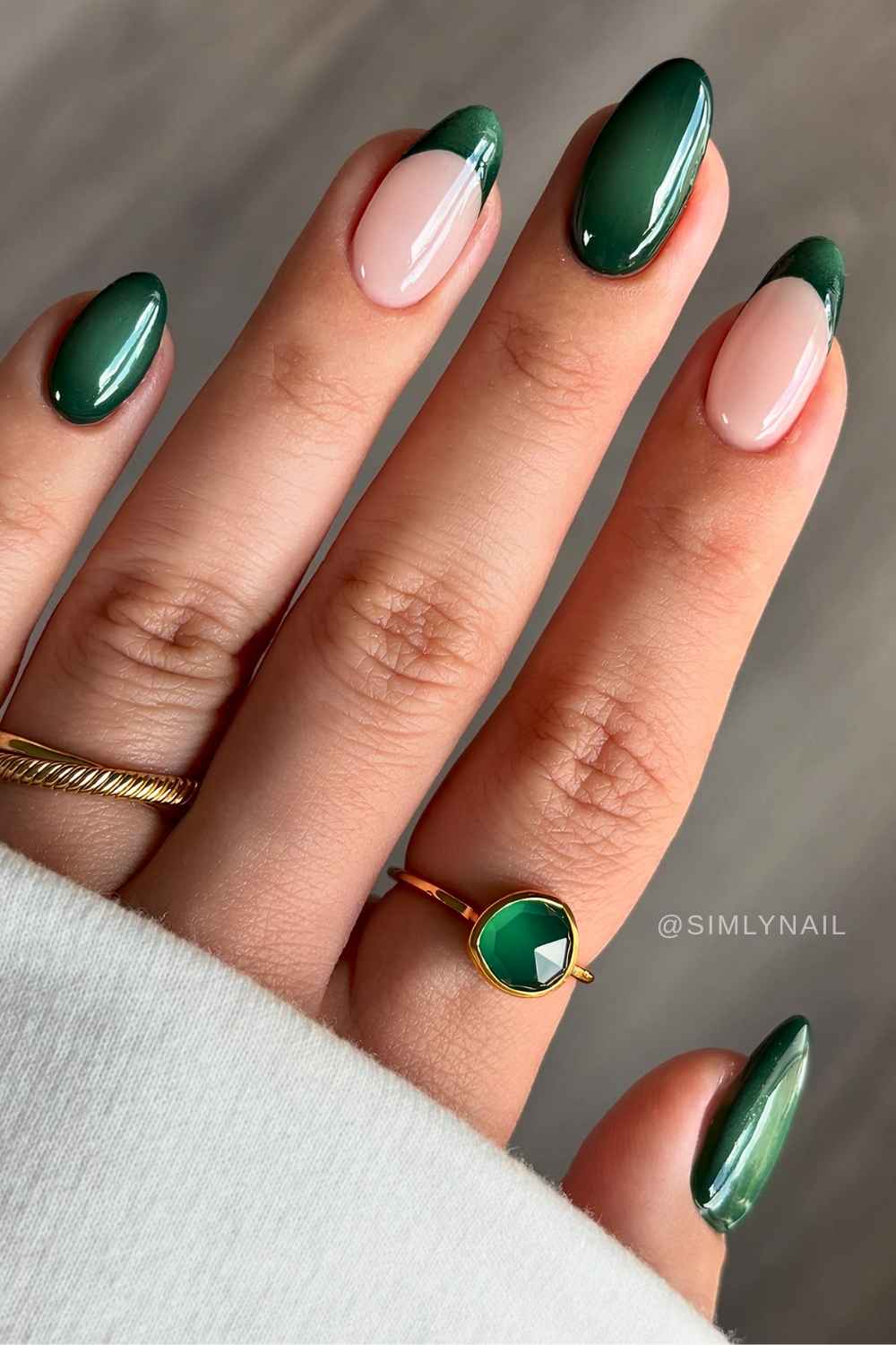 Dark green aura nails with accent French tips