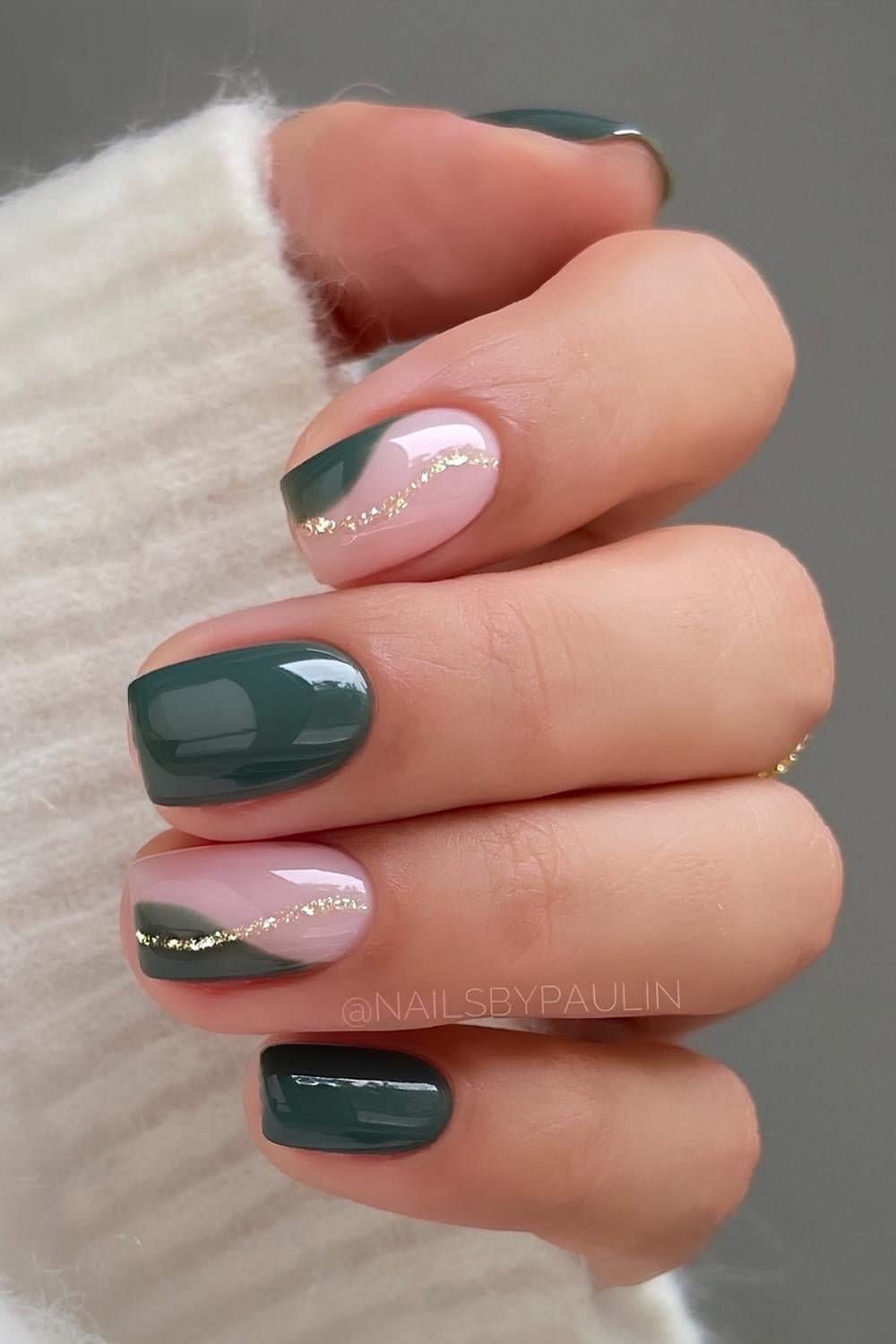 Dark green manicure with glittery swirls