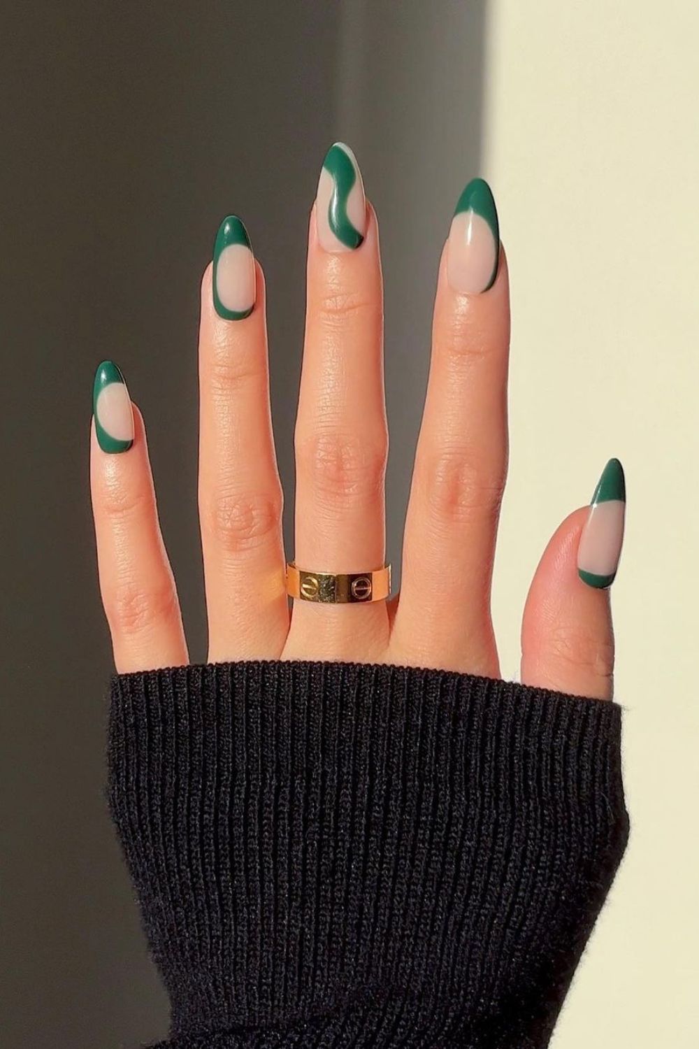 Dark green nails with negative space accent