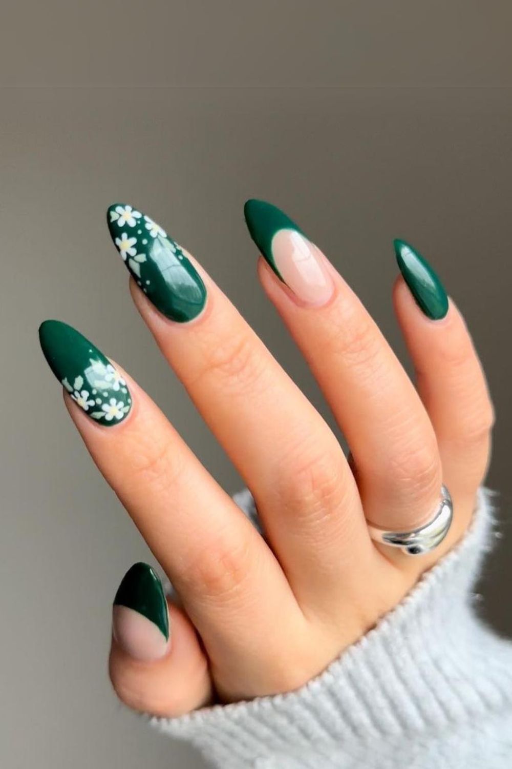 Dark green nails with white flowers