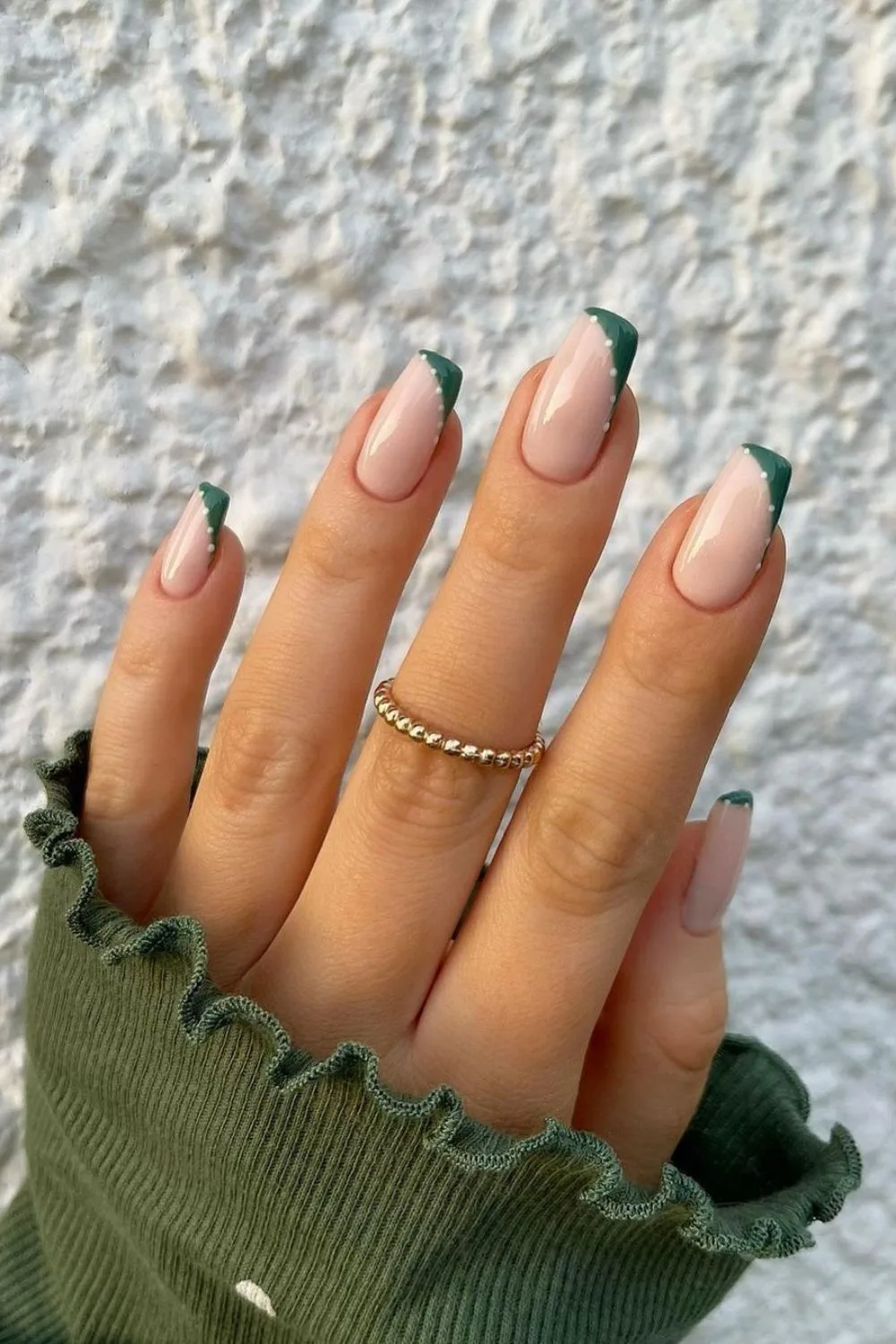 Dark green swirled french tip nails