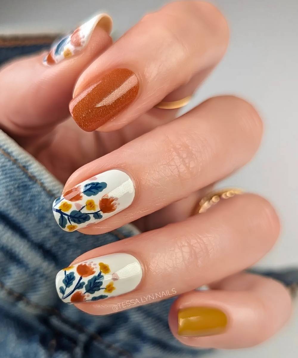 Fall floral nails in foliage colors