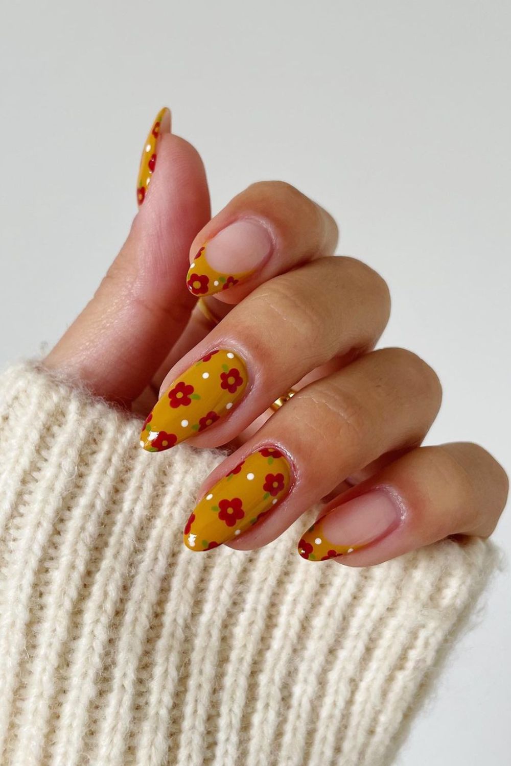 Honey yellow nails with red flowers