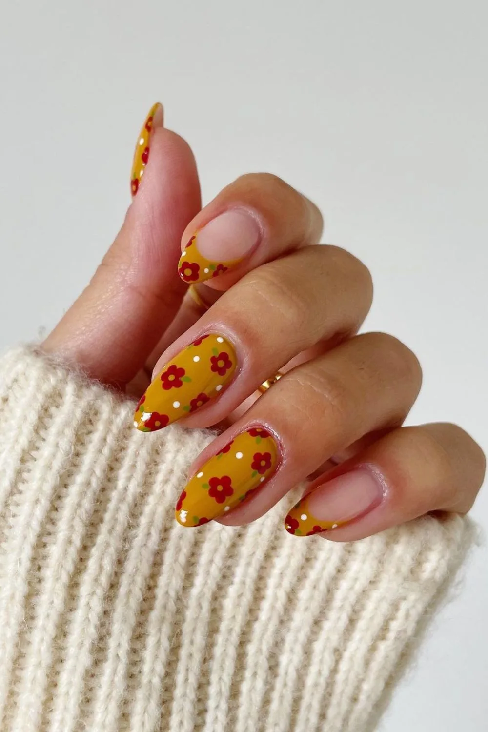 Honey yellow nails with red flowers