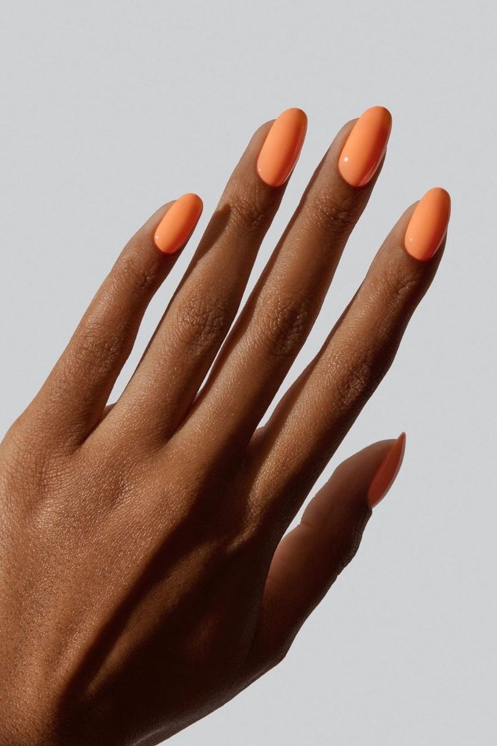 Melon orange manicure