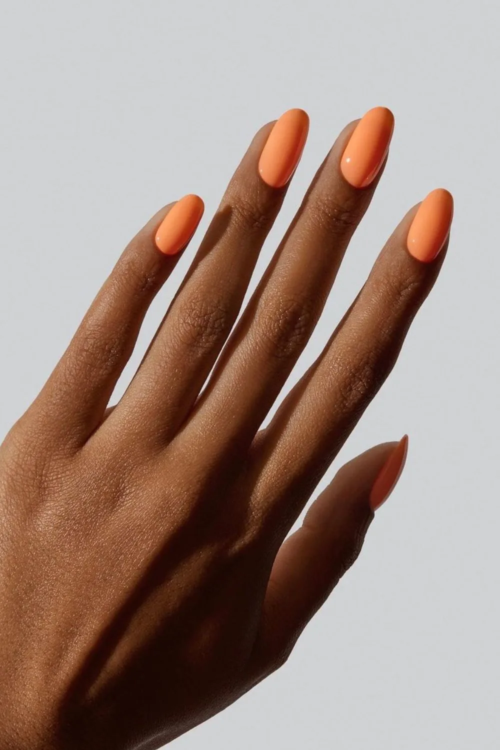 Melon orange manicure