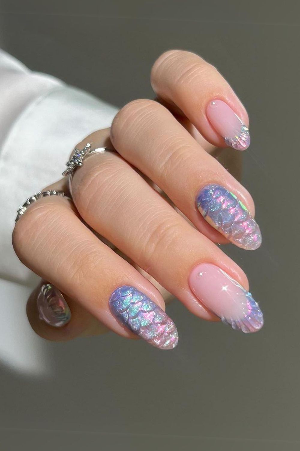 Blue nails with mermaid scale and seashell design