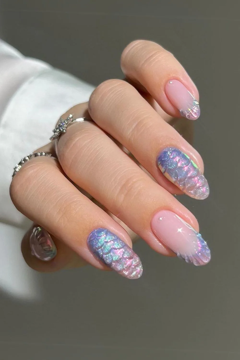 Blue nails with mermaid scale and seashell design