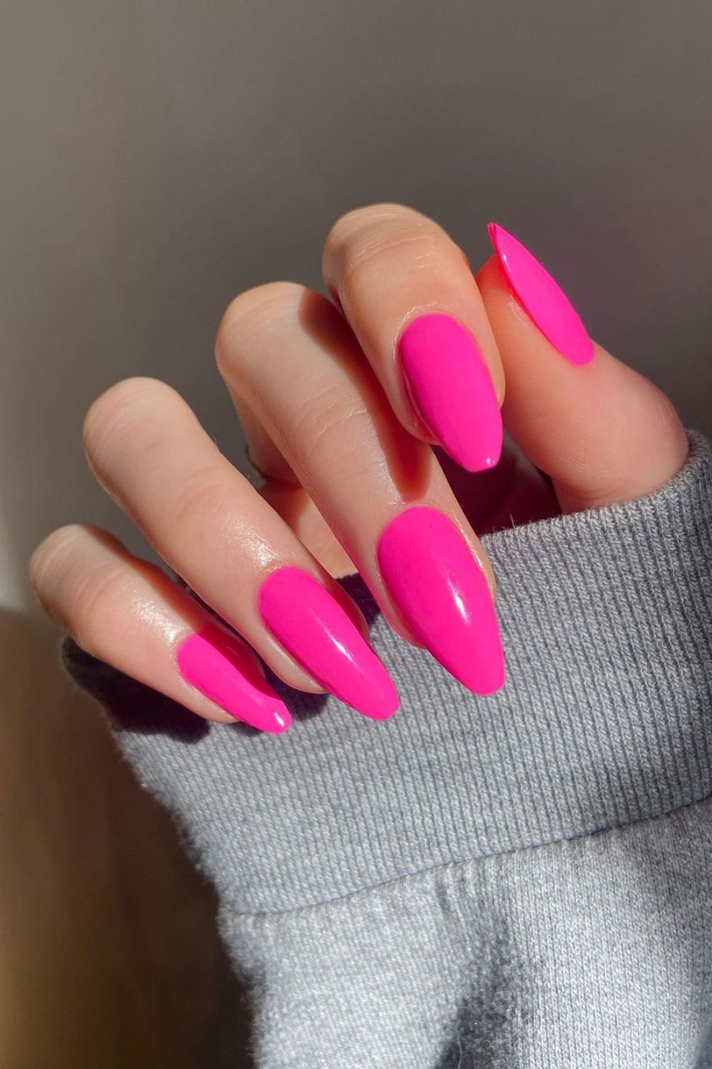 Neon pink nails