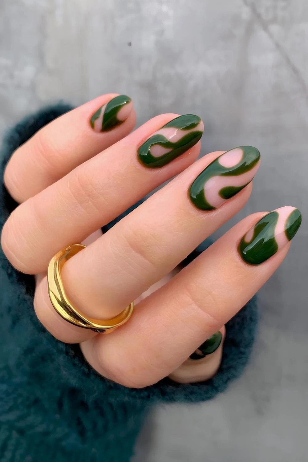 Neutral mani with abstract green swirls