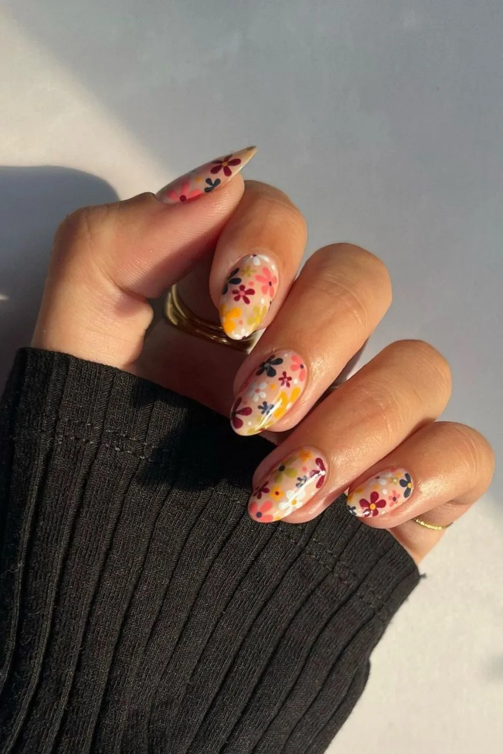 Nude nails with colorful flower pattern