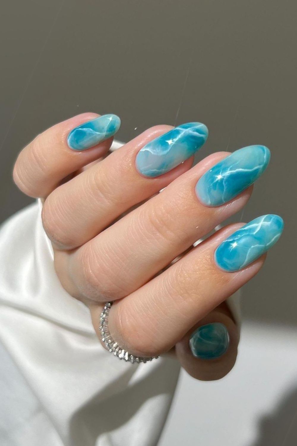 Ocean marble nail design