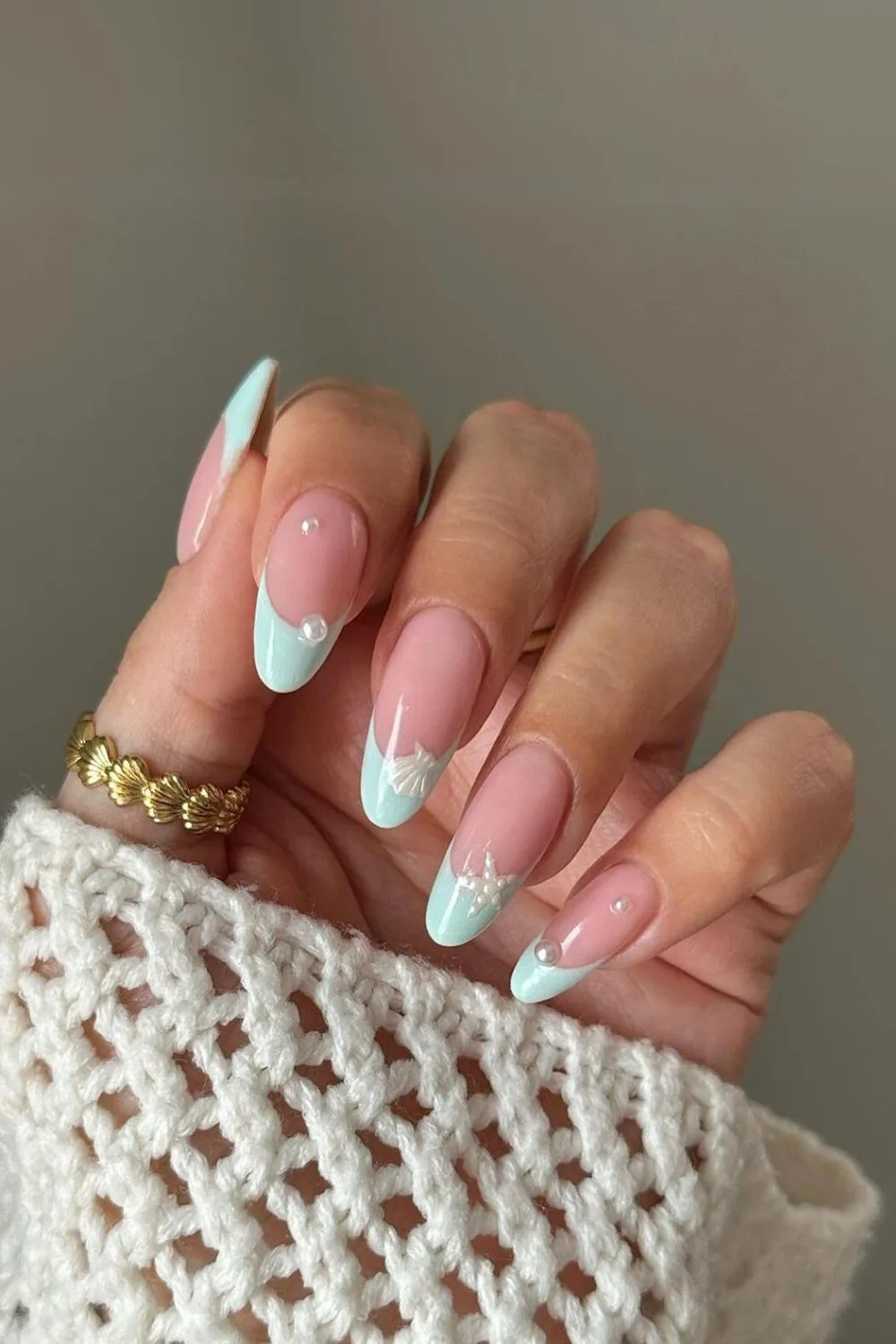 Ocean-themed french tip nails