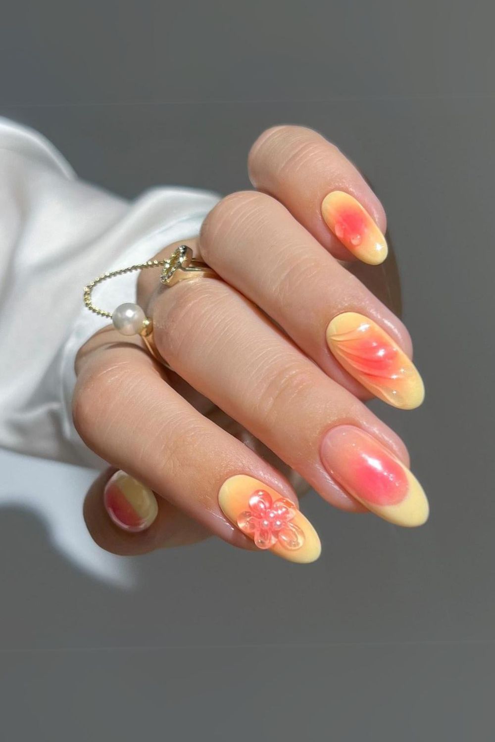 Orange and yellow hibiscus nails