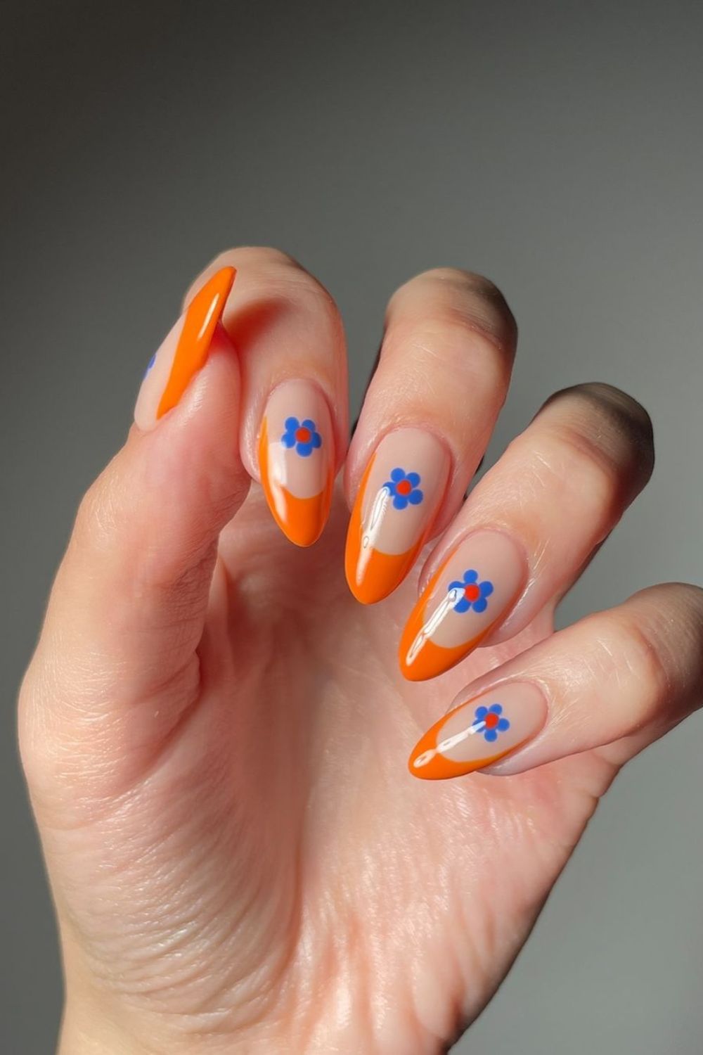 Orange floral french nails