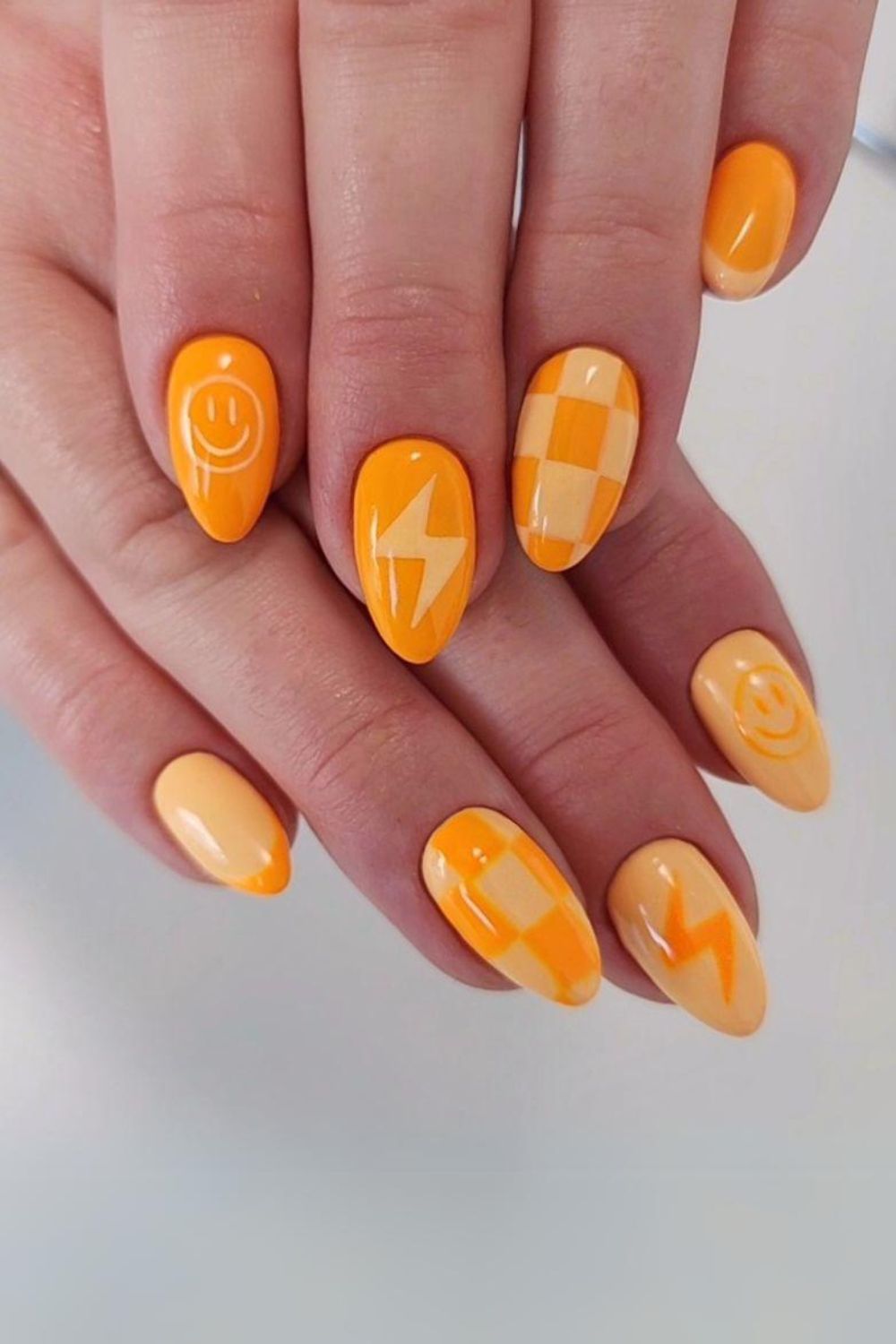 Orange mix-and-match nails