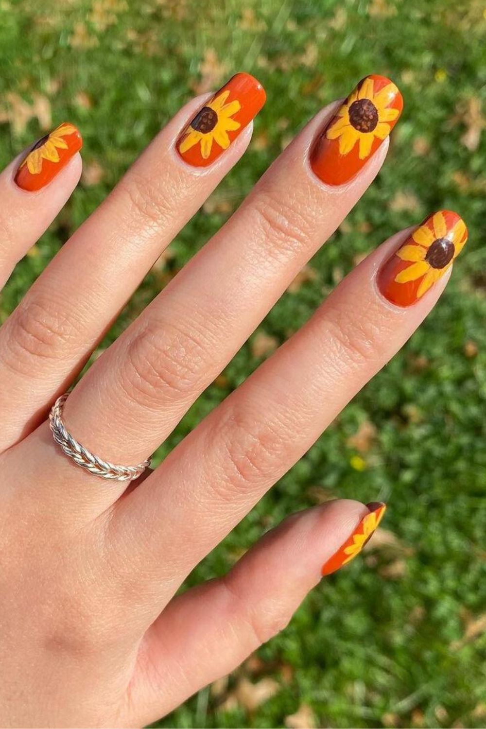 Orange sunflower nails