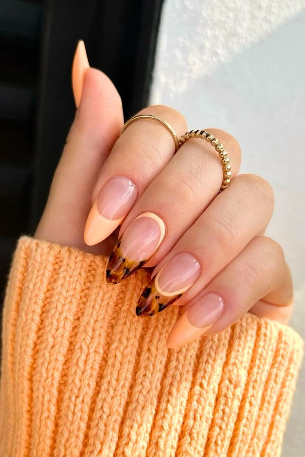 Peach orange and tortoise shell nails