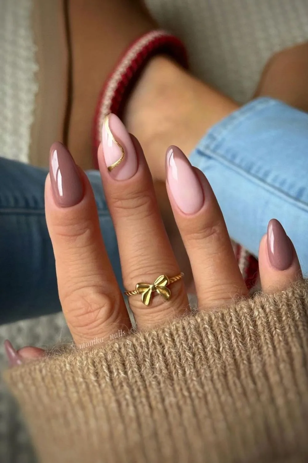 Peanut brown nails with glittery swirl accent