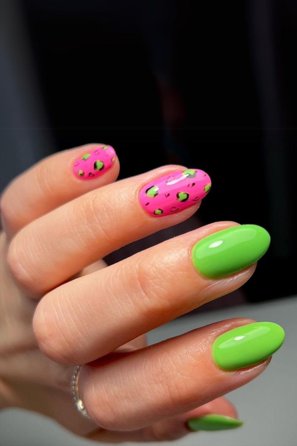 Pink and green leopard print nails