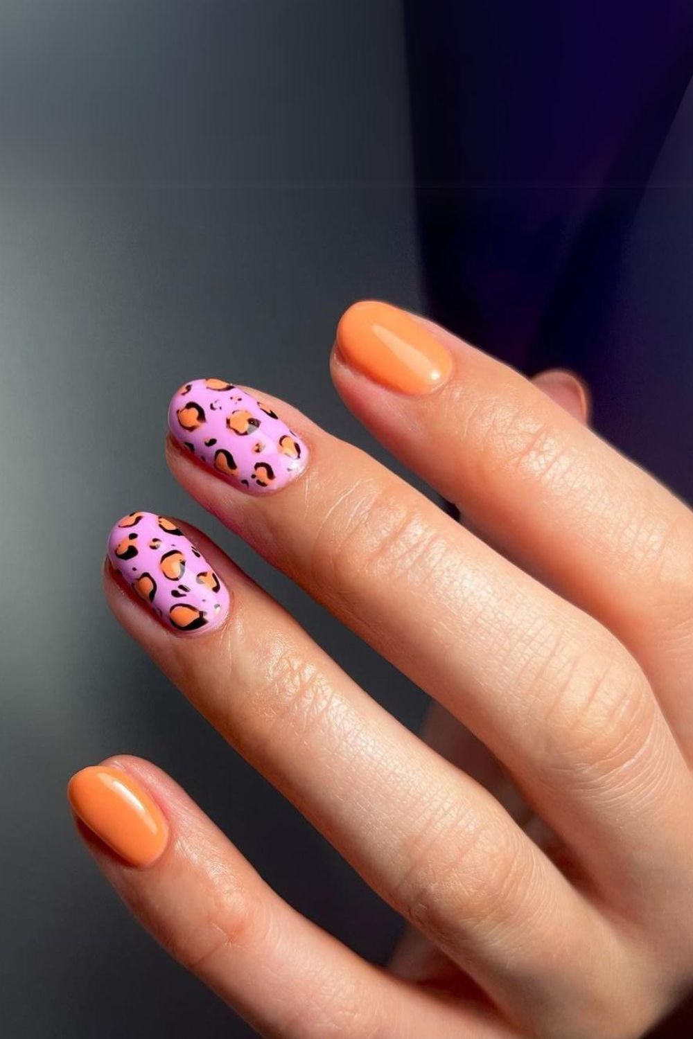 Pink and orange leopard nails