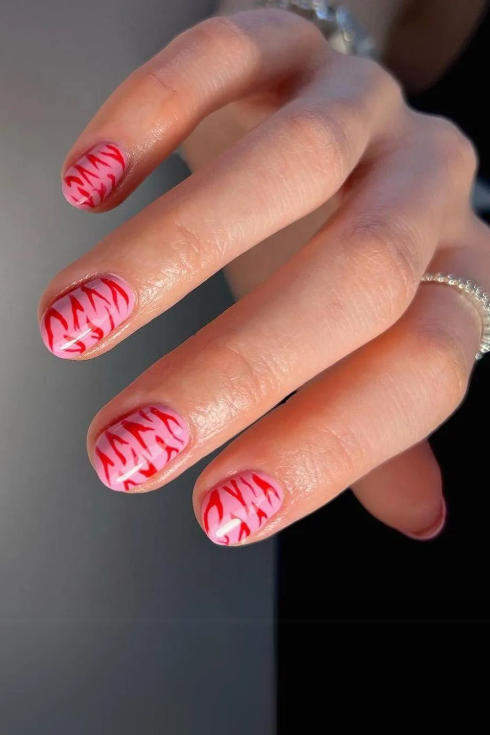 Pink and red zebra nails