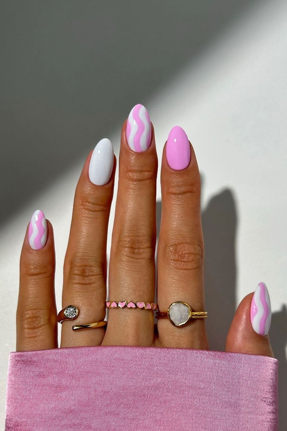 Pink and white nails with ice cream swirls