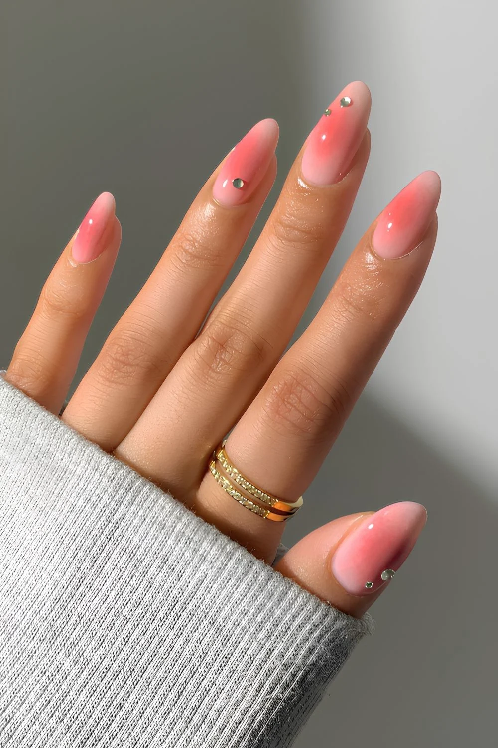 Pink aura manicure with rhinestones