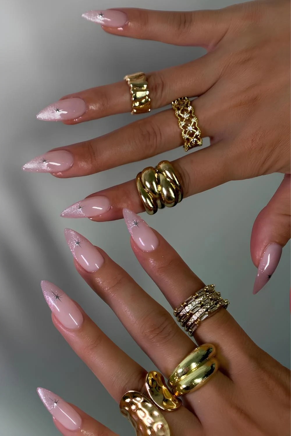 Pink cat eye French mani with silver stars