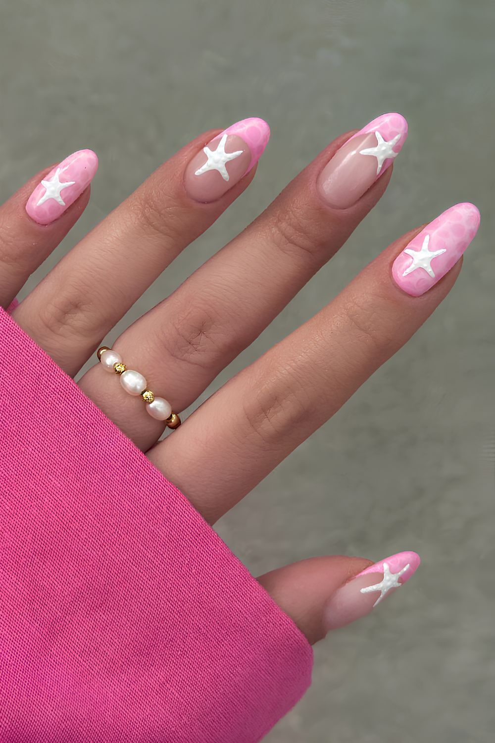 Pink summer nails with white starfish art