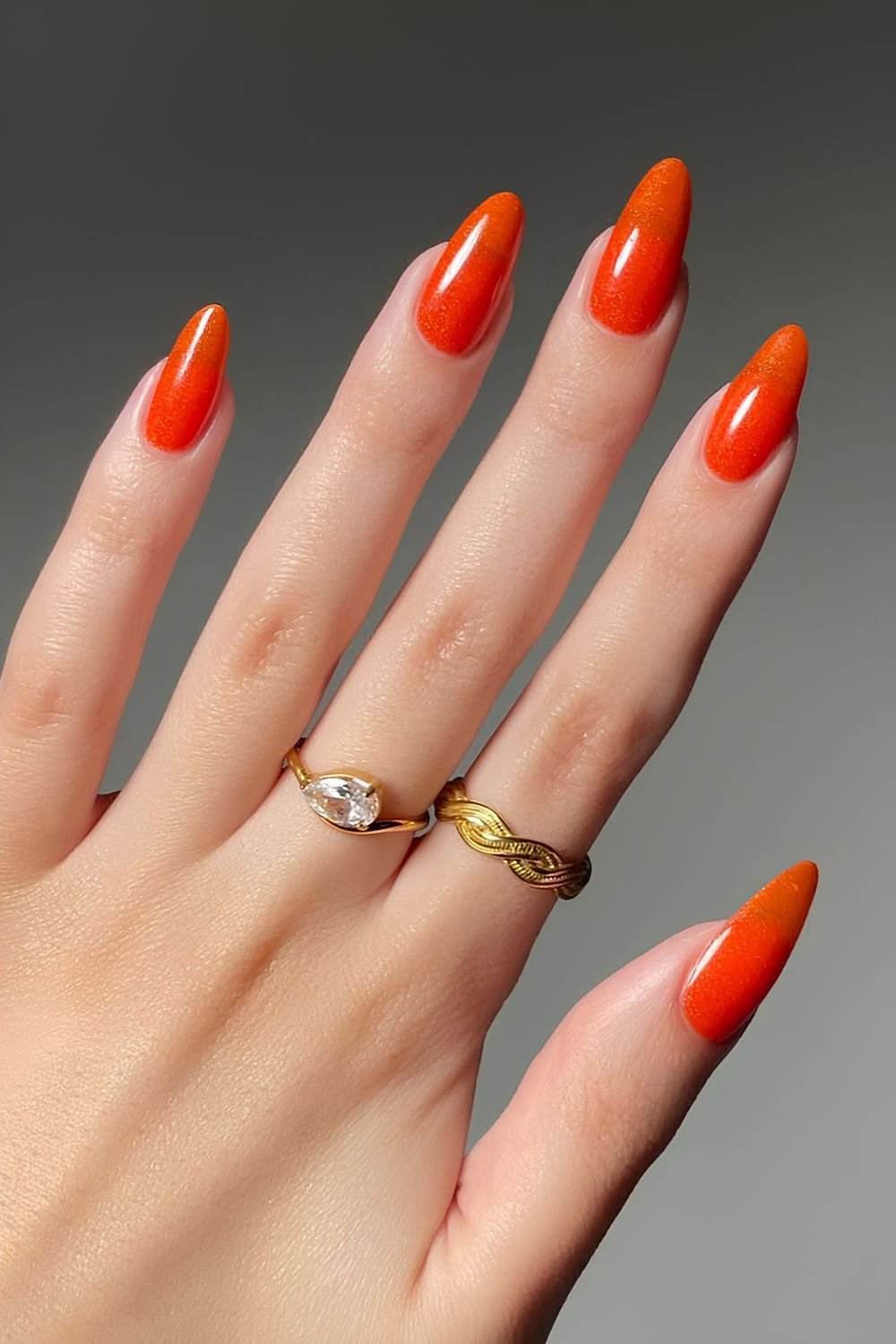 Shimmery aperol orange jelly nails