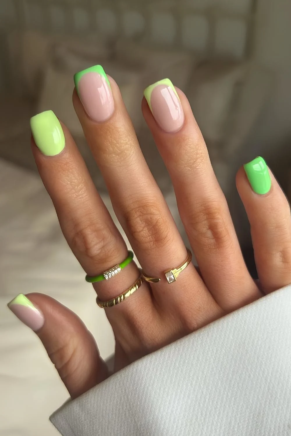 Solid and French mix nails in two shades of green