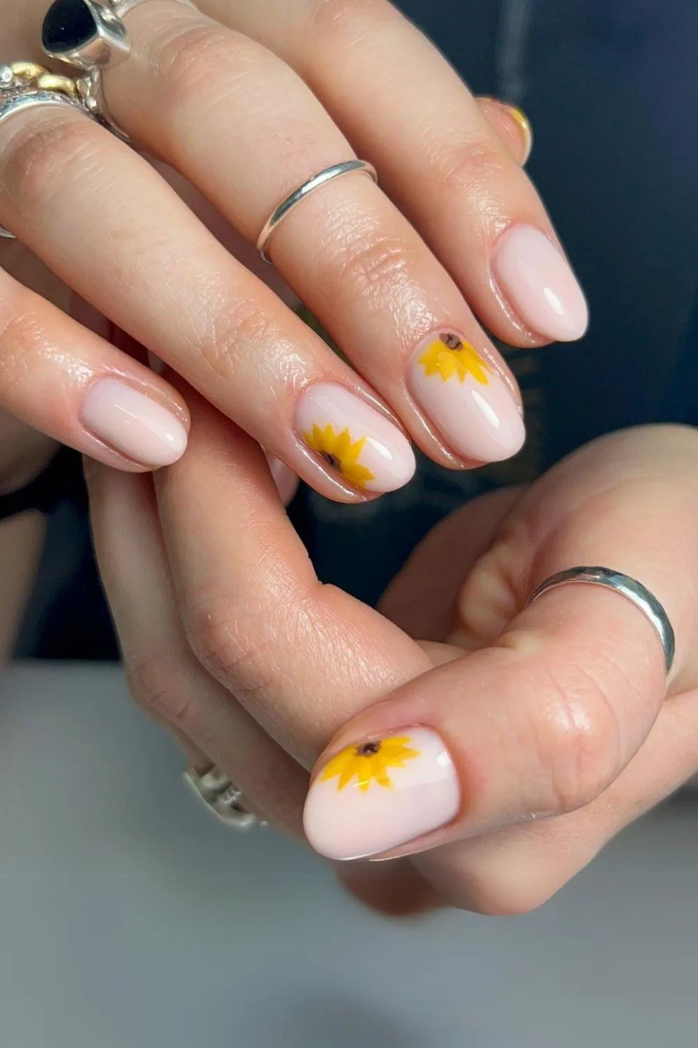 Sunflowers on a milky white nails base