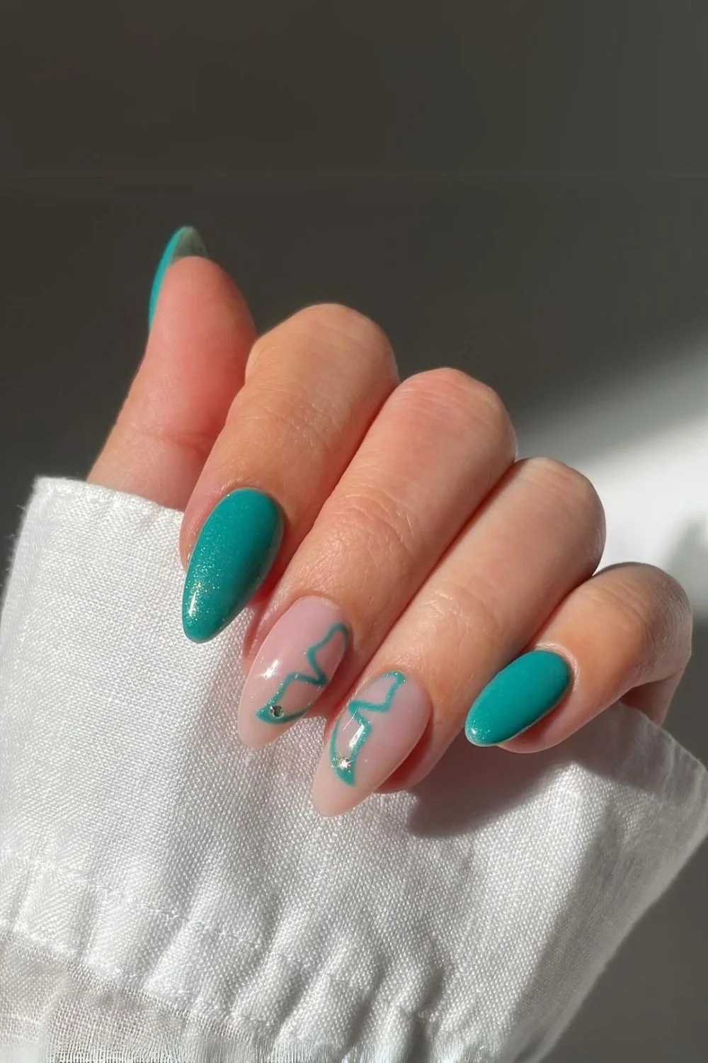 Teal butterfly nails