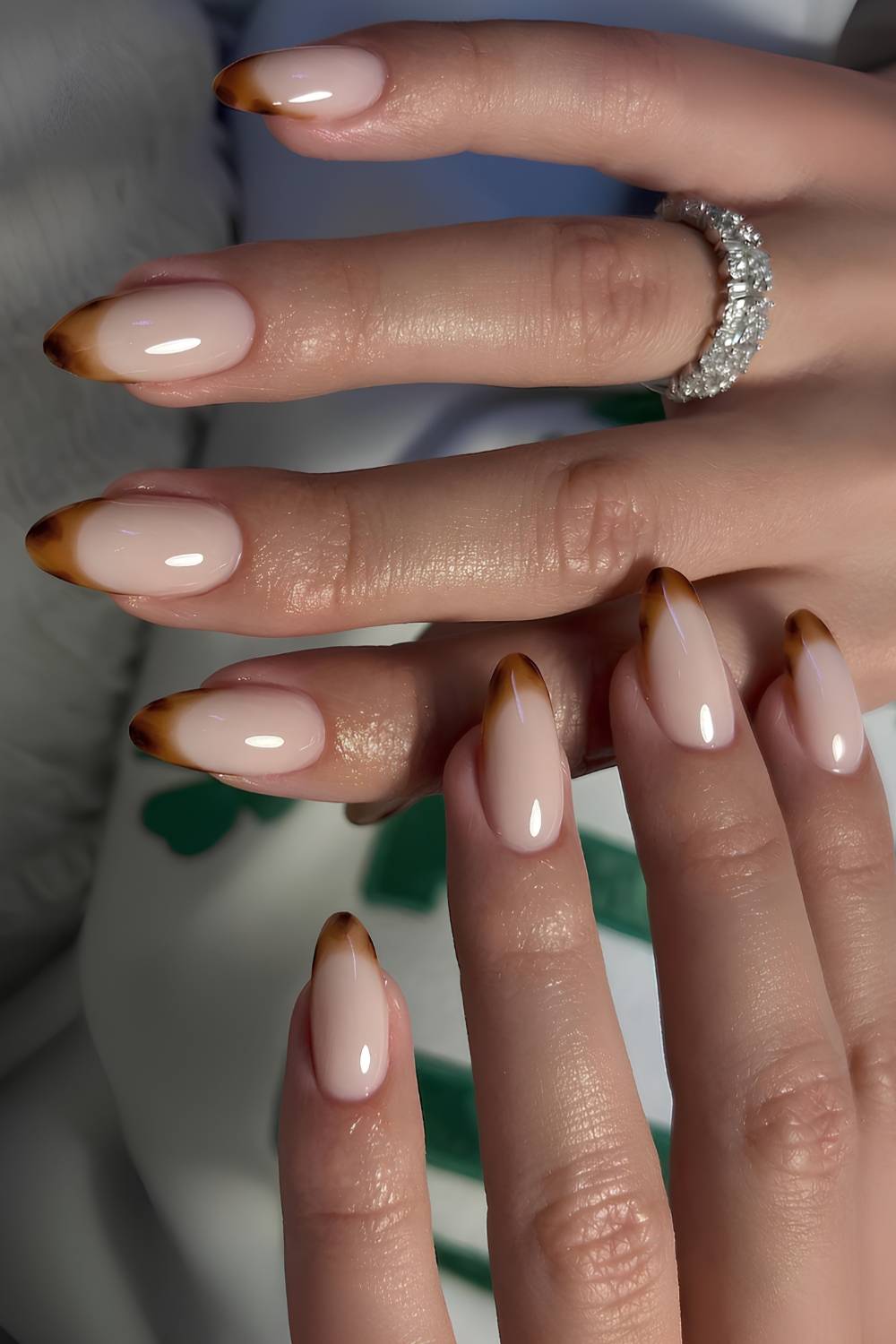 Tortoise shell French mani on a milky base