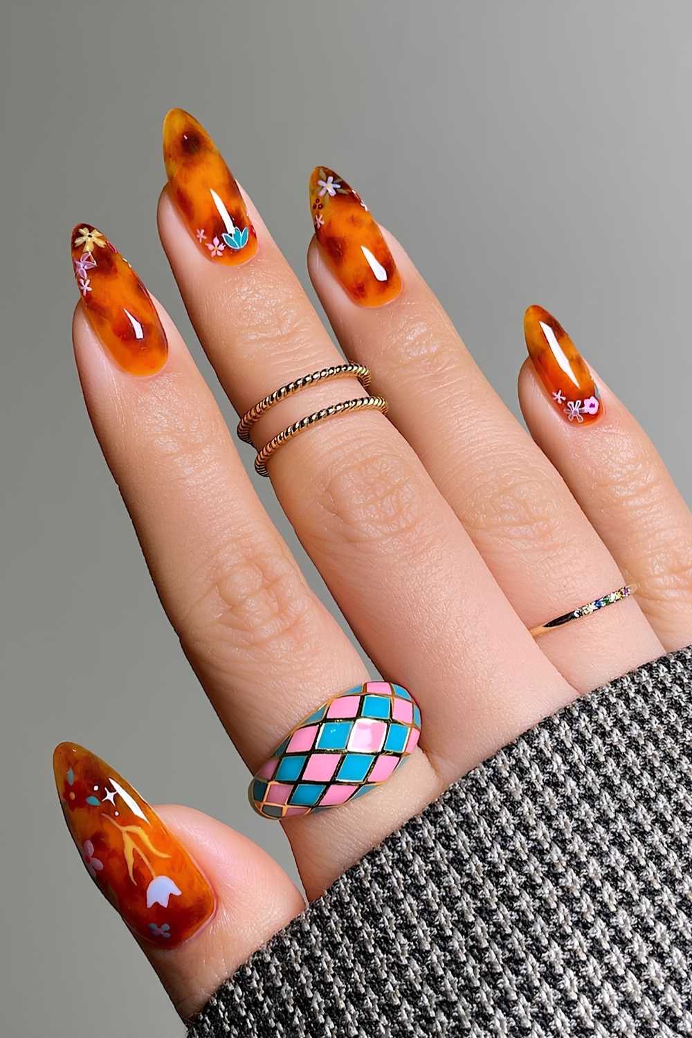 Tortoise shell manicure with accent floral art