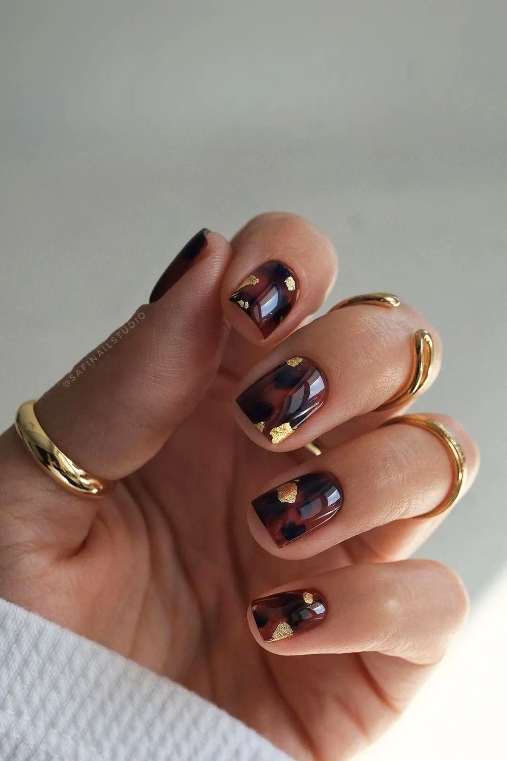 Tortoise shell nails with gold flecks