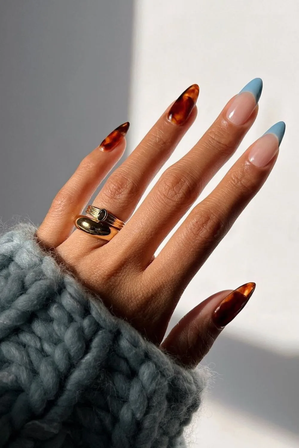 Tortoise shell nails with light blue accents