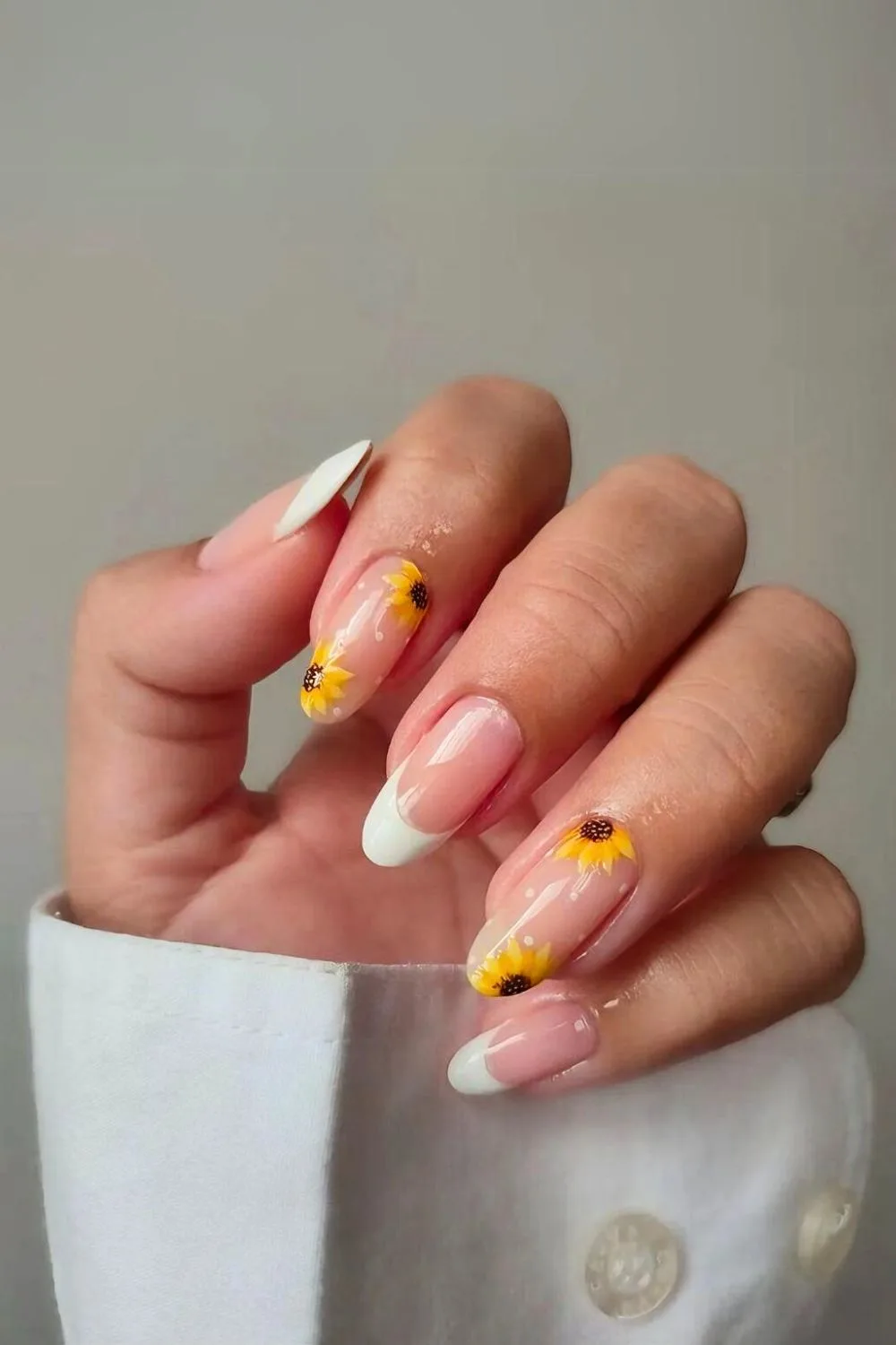 White french nails with sunflowers